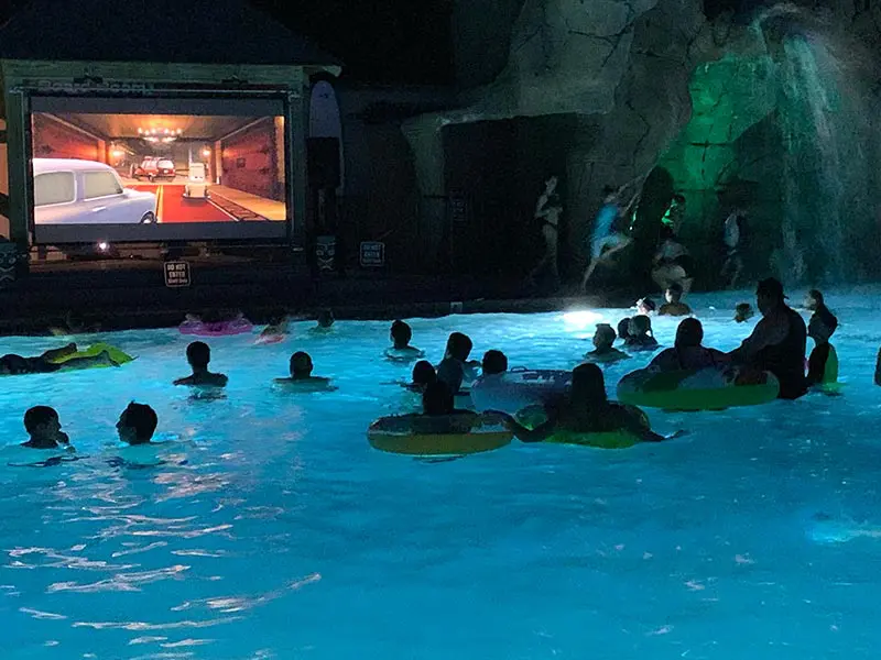 campers enjoying swim in movie theater at Moose Hillock RV Park