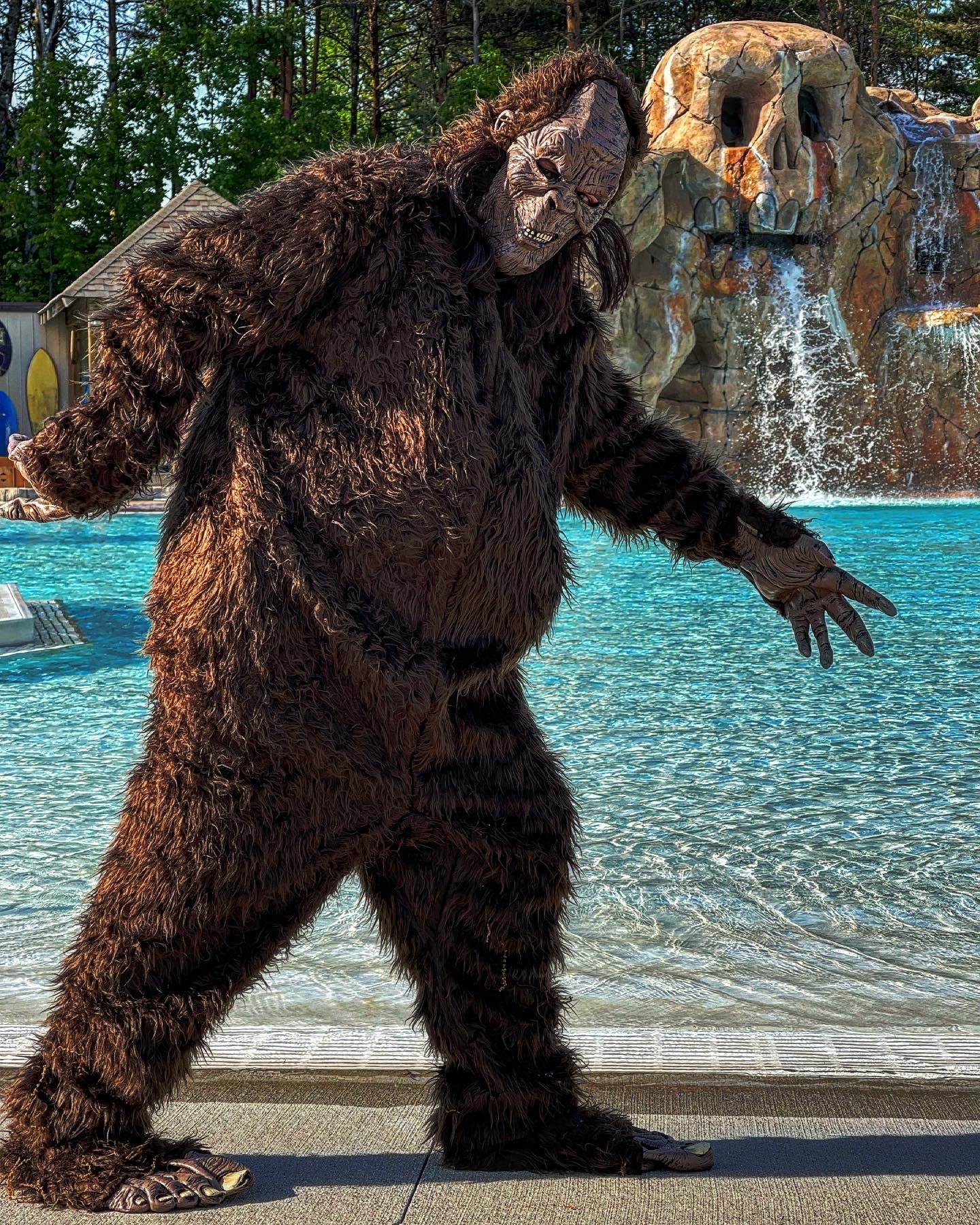 Bigfoot costume by pool